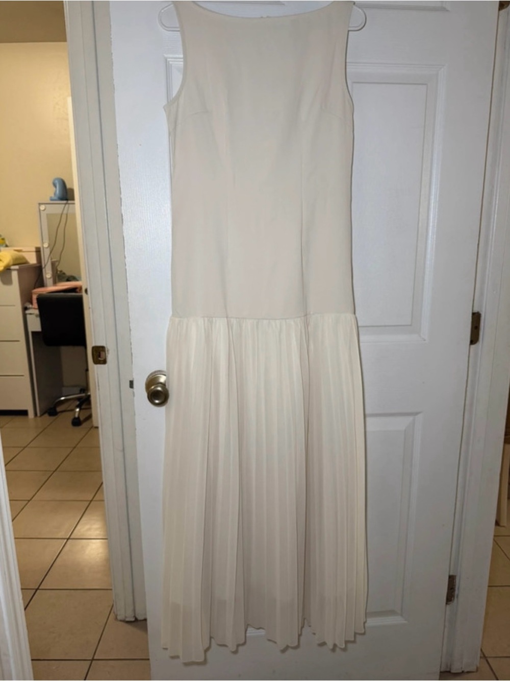 Sleeveless Cream Maxi Dress with Pleated Skirt
